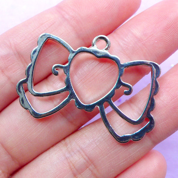 CLEARANCE Kawaii Ribbon Open Backed Bezel Charm | Lolita Jewellery Making | Hollow Deco Frame for UV Resin Filling (1 piece / Silver / 36mm x 25mm)