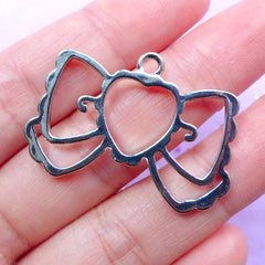 CLEARANCE Kawaii Ribbon Open Backed Bezel Charm | Lolita Jewellery Making | Hollow Deco Frame for UV Resin Filling (1 piece / Silver / 36mm x 25mm)