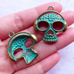 Music Skull Charms | Skull with Headphone Green Patina Pendant | Funky Halloween Jewellery Making (2 pcs / Antique Bronze / 29mm x 31mm)