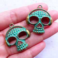 Music Skull Charms | Skull with Headphone Green Patina Pendant | Funky Halloween Jewellery Making (2 pcs / Antique Bronze / 29mm x 31mm)