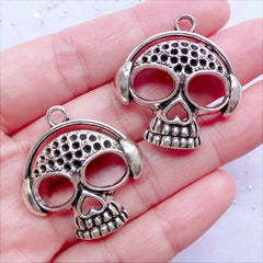 CLEARANCE Silver Skull with Headphone Charms | Music Skull Pendant | Punk Rock Jewellery DIY | Spooky Skeleton DJ Charm (2 pcs / Tibetan Silver / 29mm x 31mm)