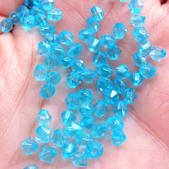 Bicone Beads in 4mm | Acrylic Rhombus Beads | Mini Spacer Beads | Plastic Diamond Bead | Faceted Gemstone Beads | Craft Supply (100pcs / Transparent Sky Blue)