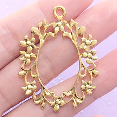 Floral Deco Frame Charm | Hollow Oval Pendant with Flower Border | Open Backed Bezel for UV Resin Filling | Resin Jewelry Findings (1 piece / Gold / 34mm x 43mm)