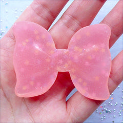 Big Bow Cabochon with Star Sprinkles | Translucent Resin Bow Cabochon with Confetti | Pastel Kei Decoden | Cell Phone Case Deco | Kawaii Chunky Jewelry Making (1 piece / Coral Pink / 54mm x 41mm / Flat Back)