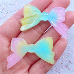 Rainbow Gradient Ribbon Cabochons with Glitter | Shimmer Ribbon Flatback in Glittery Pastel Galaxy Color | Kawaii Cabochon Supplies | Resin Decoden Pieces | Fairy Kei Decoration | Planner Deco (2pcs / Pink Blue Yellow / 45mm x 29mm / Flat Back)