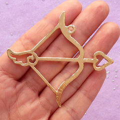 Sagittarius Charm | Arrow and Bow Pendant | Horoscope Open Backed Bezel | Zodiac Sign Deco Frame for UV Resin Filling | Astrology Jewelry Supplies (1 piece / Gold / 53mm x 58mm)