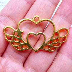 CLEARANCE Double Heart with Wing Open Backed Bezel Charm | Winged Heart Pendant | Kawaii Magical Girl Jewelry Supplies | Deco Frame for UV Resin Filling (1 piece / Gold / 41mm x 23mm)