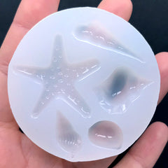 Starfish & Seashell Shttps://miniaturesweet.myshopify.com/admin/productsilicone Molds (5 Cavity) | Nutmeg Shell Mold | Horn Snail Shell Mold | Flexible Epoxy Resin Mould | Food Safe Fondant Mold