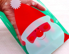CLEARANCE Christmas Santa Claus Gift Bags / Plastic Cello Bags / Christmas Product Packaging Bag / Treat Bags / Favor Bags (14cm x 20cm / 20pcs) GB146